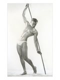 Muscle Man Posing with Bamboo Pole