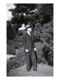 Man in Three-Piece Suit Standing in Garden