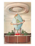 Receptionist in Front of Elongated Globe