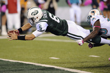 New York Jets and Miami Dolphin: Mark Sanchez and Reshad Jones