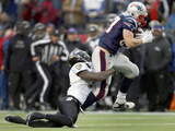 Baltimore Ravens and New England Patriots - Jan 22  2012: Bernard Pollard and Rob Gronkowski