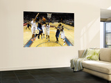 Denver Nuggets v Charlotte Bobcats: Carmelo Anthony  Boris Diaw and Nazr Mohammed