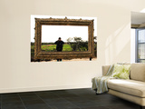 Man Taking Photo Inside Giant Frame Overlooking Werribee Open Range Zoo