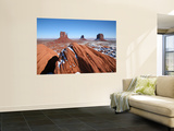 Buttes Towering Above Snowy Desert Floor of Monument Valley