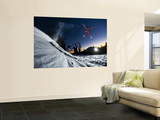 Skier Jumping and Grabbing His Skis at Mout Bachelor