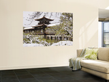 Snow Covered Chinese Style Bridge over Pond in Garden of Heian Shrine