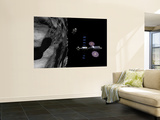 A Manned Maneuvering Vehicle Descends Toward the Surface of a Small Asteroid