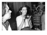 WWD - June 1973 - Anjelica Huston with Camera