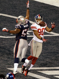 New York Giants and New England Patriots - Super Bowl XLVI - February 5  2012: Jerod Mayo and Victo