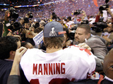 New York Giants and New England Patriots - Super Bowl XLVI - February 5  2012: Eli Manning