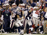 New York Giants and New England Patriots - Super Bowl XLVI - February 5  2012: Mario Manningham
