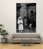 Lorenza Curiel in White First Communion Dress Waiting for Mother to Lock Door