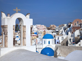 Bell Tower and Blue Domes of Church in Village of Oia  Santorini  Greece