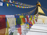 Prayer Flags Flutter from the Apex of Bodnath Stupa  Kathmandu  Nepal