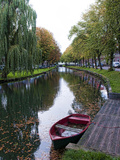 Canal with Boats in Small Town of Edam  Netherlands