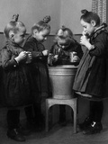 Little Girls Brushing their Teeth