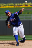 Surprise  AZ - March 11: Cleveland Indians v Texas Rangers - Derek Holland