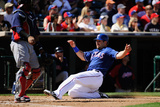Surprise  AZ - March 11: Cleveland Indians v Texas Rangers - Mitch Moreland  Carlos Santana