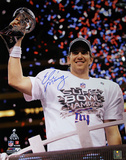Eli Manning Signed Super Bowl XLVI with Trophy Vertical Photo