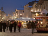 Christmas Market Stalls and People at Marktstrasse at Twilight  Bad Tolz Spa Town  Bavaria  Germany