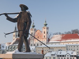 Statue Honouring Townspeople and Baroque Michaelerkirche Church Dating From 1635 at Sunset  Austria