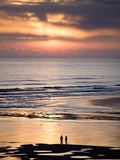 Man and Woman in Silhouette Looking Out Over North Sea at Sunsrise From Alnmouth Beach  England