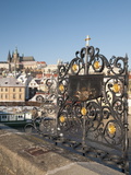St John of Nepomuk Shrine at Charles Bridge with Prague Castle and Mala Strana in Background