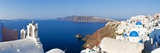 Blue Domed Churches in the Village of Oia  Santorini (Thira)  Cyclades Islands  Aegean Sea  Greece
