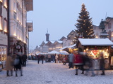 Christmas Tree With Stalls and People at Marktstrasse in the Spa Town of Bad Tolz  Bavaria