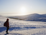 Hiker on Snow Covered Pen Y Fan Mountain  Brecon Beacons National Park  Powys  Wales