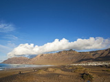 Volcanic Cliffs of the Risco De Famara Rising Over Lanzarote's Finest Beach  Canary Islands