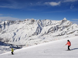 Skiers  Mountain Scenery in Cervinia Ski Resort  Cervinia  Valle D'Aosta  Italian Alps  Italy