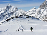 Skiers  Mountain Scenery in Cervinia Ski Resort  Cervinia  Valle D'Aosta  Italian Alps  Italy