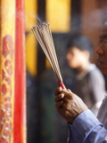 Burning Incense During Tet  the Vietnamese Lunar New Year Celebration  Thien Hau Temple  Vietnam