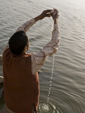 Hindu Performing His Daily Devotion Ritual to Ganga in Varanasi  Uttar Pradesh  India  Asia