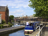 Canal Boat Negotiating a Lock  Camden Lock  London  England  United Kingdom  Europe