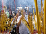 Burning Incense During Tet  the Vietnamese Lunar New Year Celebration  Thien Hau Temple  Vietnam