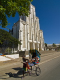 Man With a Rickshaw in Front of a Modern Church in Mahajanga  Madagascar  Africa