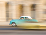 Panned Shot of a Classic American Car on the Malecon  Havana  Cuba  West Indies  Central America