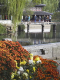 People Crossing Footbridge in Humble Administrator's Garden  Suzhou  Jiangsu  China  Asia