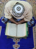 Muslim Man Reading the Quran in Mosque  Ho Chi Minh City  Vietnam  Indochina  Southeast Asia  Asia