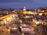 View Over Djemaa El Fna at Dusk With Foodstalls and Crowds of People  Marrakech  Morocco