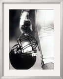 Low Angle View of An American Football Player Holding a Helmet