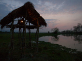 A Kaziranga Park Guard Keeps Watch Through the Night in Baguri