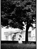 A Little Girl Picking Flowers in Florence  Italy