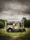 An Old Truck with a 'Vermont Cheese' Sign on a Farm in Ludlow