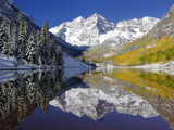 The Maroon Bells Casting Reflections in a Calm Lake in Autumn