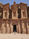 Tourists Being Photographed at the Facade of the Monastery Carved into the Red Rock at Petra  UNESC