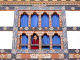 Young Buddhist Monk Looking Out of a Window at Trongsa Dzong  Trongsa  Bhutan  Asia