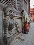Stone Lions Guard a Prayer Wall in Durbar Square  Kathmandu  Nepal  Asia